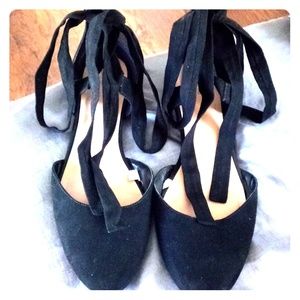 Black ballerina like sandals with black lace ties